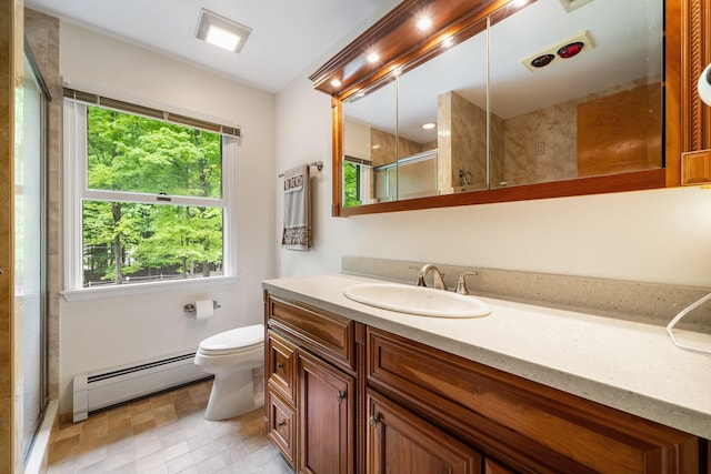 full bathroom with a baseboard radiator, healthy amount of natural light, a stall shower, and toilet