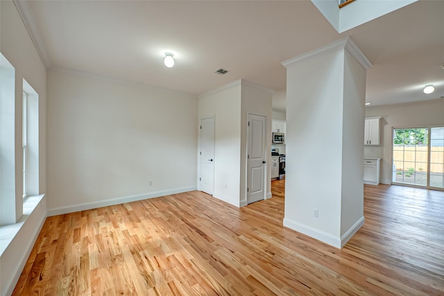 36-A Maple Ave, Port Jefferson Station, NY 11776 - empty room featuring light wood-type flooring, crown molding, and baseboards