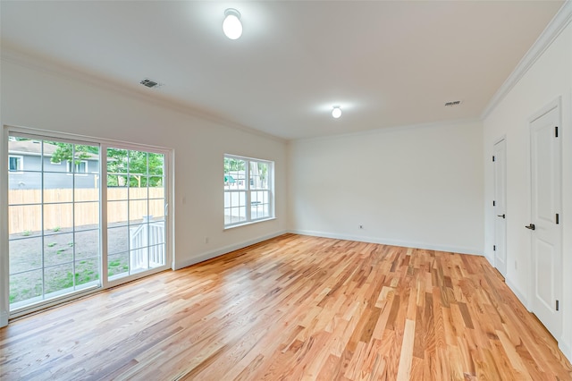 36-A Maple Ave, Port Jefferson Station, NY 11776 - spare room with crown molding, light wood-style flooring, and baseboards