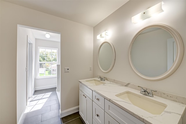 36-A Maple Ave, Port Jefferson Station, NY 11776 - full bath featuring tile patterned floors, double vanity, and baseboards
