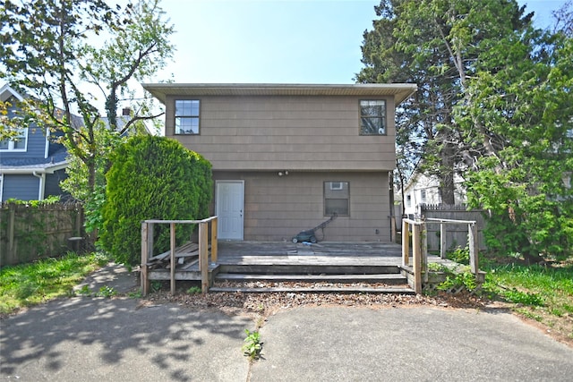 51 Manor Rd, Valley Stream, NY 11580 - rear view of house with a deck and fence
