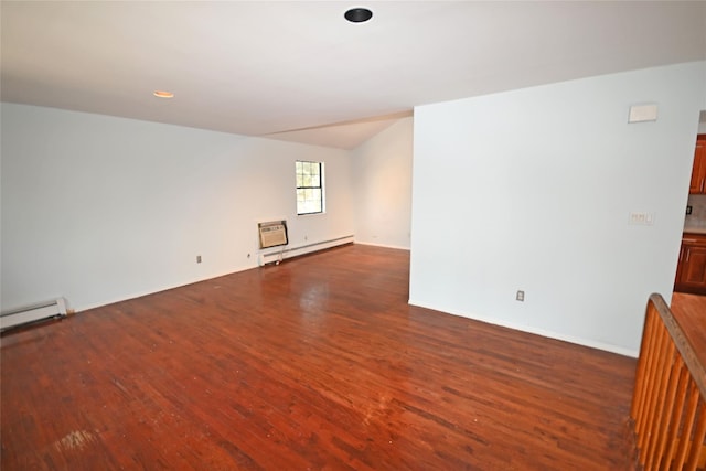 51 Manor Rd, Valley Stream, NY 11580 - unfurnished room with a baseboard heating unit, wood finished floors, and baseboards