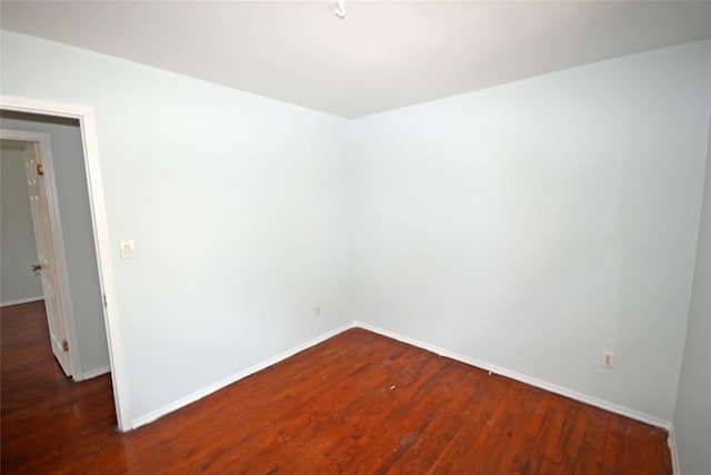 51 Manor Rd, Valley Stream, NY 11580 - spare room featuring wood finished floors and baseboards