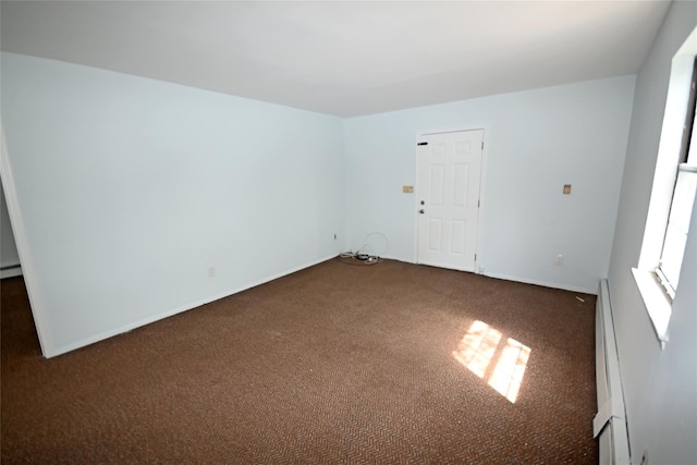 51 Manor Rd, Valley Stream, NY 11580 - carpeted empty room featuring baseboards