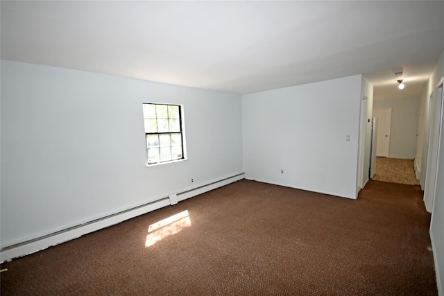 51 Manor Rd, Valley Stream, NY 11580 - carpeted spare room with a baseboard heating unit