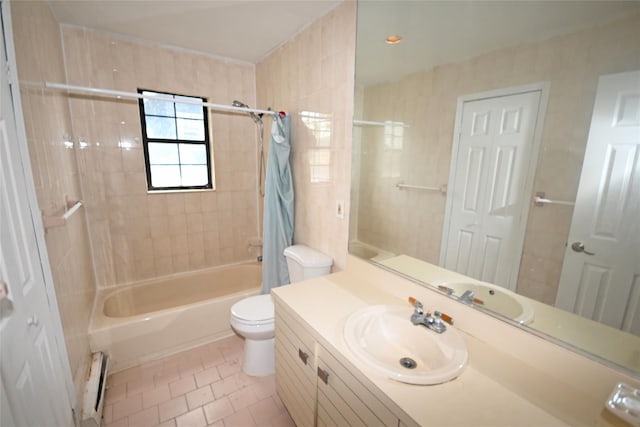 51 Manor Rd, Valley Stream, NY 11580 - full bath featuring tile patterned floors, a baseboard radiator, shower / bath combo, toilet, and vanity