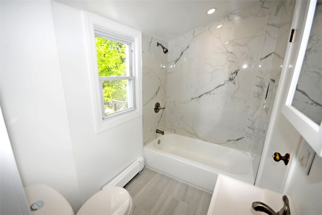 full bath with a baseboard heating unit, toilet, shower / bath combination, and recessed lighting