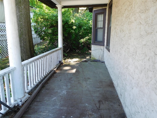 view of patio featuring a porch