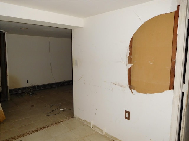 spare room with tile patterned flooring