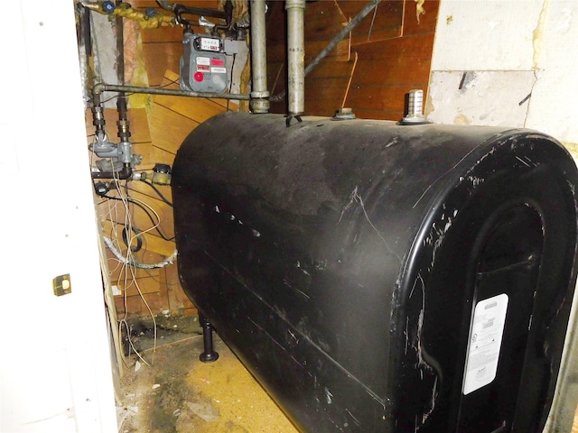 utility room with oil tank and gas meter