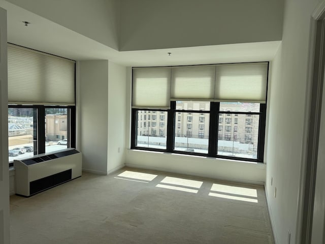 100 New Roc City Pl Unit 408, New Rochelle, NY 10801 - spare room with carpet floors, healthy amount of natural light, and baseboards