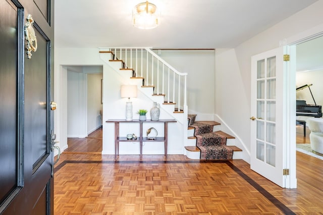 16 Cayuga Rd, Scarsdale, NY 10583 - staircase featuring baseboards and french doors
