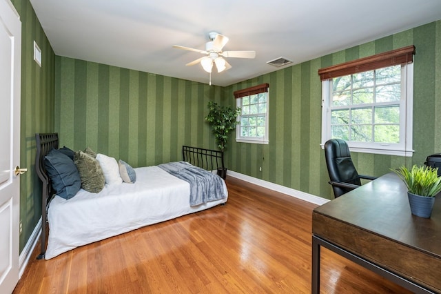16 Cayuga Rd, Scarsdale, NY 10583 - bedroom with wood finished floors, a desk, a ceiling fan, and baseboards