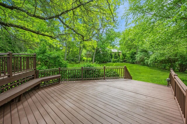 16 Cayuga Rd, Scarsdale, NY 10583 - wooden deck featuring a yard and view of scattered trees