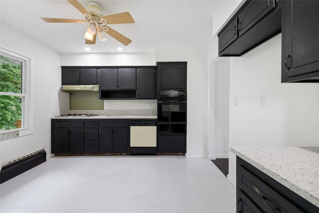 kitchen with black oven, dishwasher, a warming drawer, under cabinet range hood, and a ceiling fan