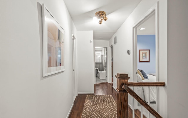 90 Gannet Dr, Commack, NY 11725 - corridor featuring dark wood-style flooring and baseboards