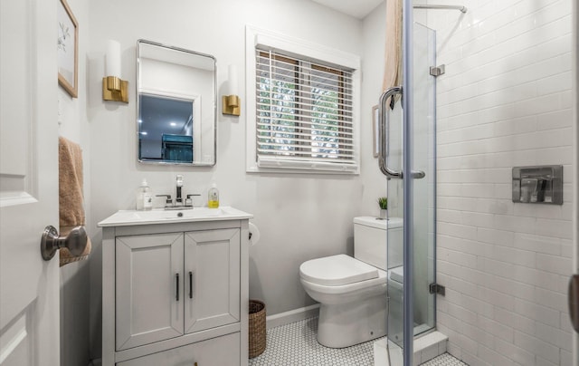 90 Gannet Dr, Commack, NY 11725 - bathroom with a shower stall, vanity, tile patterned flooring, toilet, and baseboards