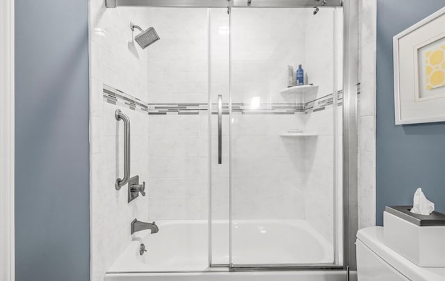 90 Gannet Dr, Commack, NY 11725 - bathroom featuring toilet and shower / bath combination with glass door