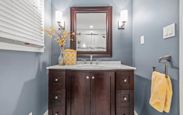 90 Gannet Dr, Commack, NY 11725 - bathroom featuring vanity, baseboards, and an enclosed shower