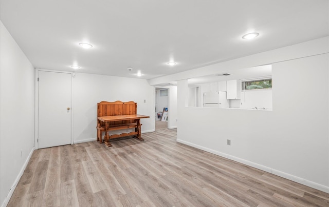 90 Gannet Dr, Commack, NY 11725 - living room with light wood finished floors and baseboards