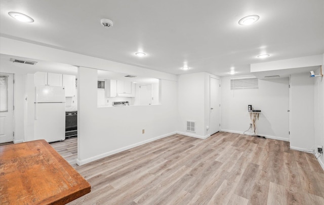 90 Gannet Dr, Commack, NY 11725 - finished below grade area featuring freestanding refrigerator, light wood-style flooring, and baseboards