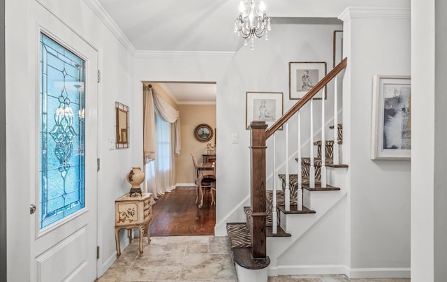 90 Gannet Dr, Commack, NY 11725 - foyer entrance with ornamental molding, stairs, a chandelier, and baseboards