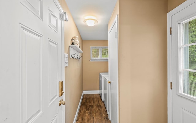 90 Gannet Dr, Commack, NY 11725 - laundry room with washer and clothes dryer, dark wood-style flooring, baseboards, and plenty of natural light