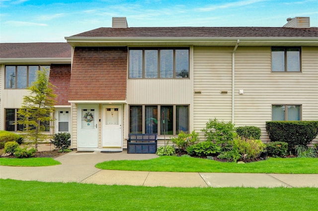 view of front of property with a chimney