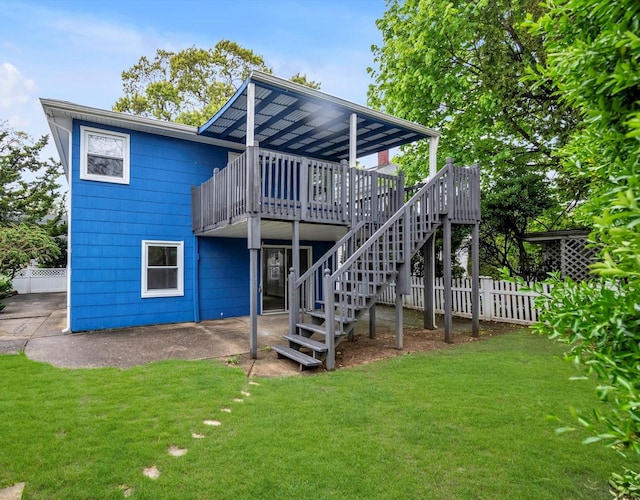 76 Melrose Ave, Lynbrook, NY 11563 - rear view of house featuring a deck and stairway