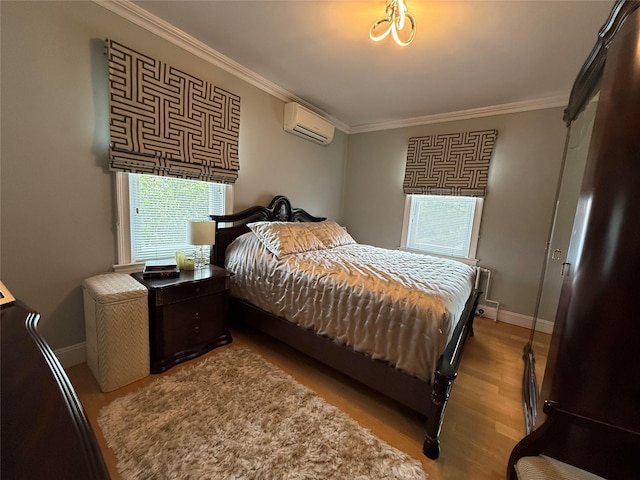 83-46 Penelope Ave, Middle Village, NY 11379 - bedroom featuring a wall mounted AC, ornamental molding, wood finished floors, and baseboards