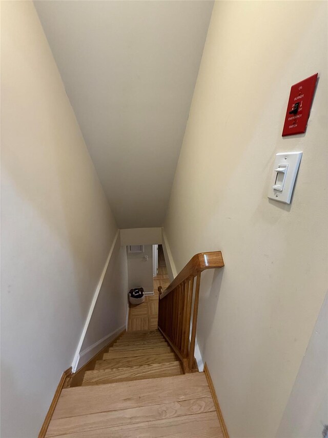 83-46 Penelope Ave, Middle Village, NY 11379 - stairway featuring wood finished floors and baseboards