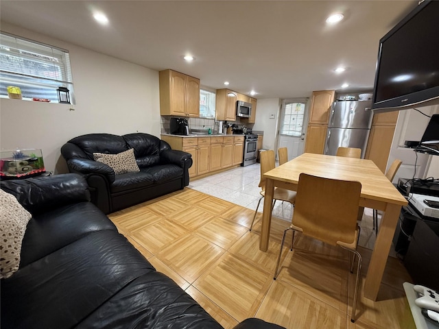 83-46 Penelope Ave, Middle Village, NY 11379 - living room featuring light tile patterned flooring and recessed lighting