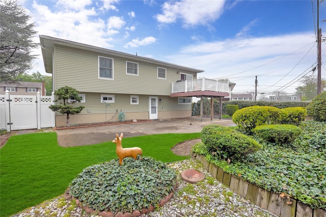 2228 Stacey Ct, North Bellmore, NY 11710 - rear view of house featuring a patio, a gate, and a wooden deck