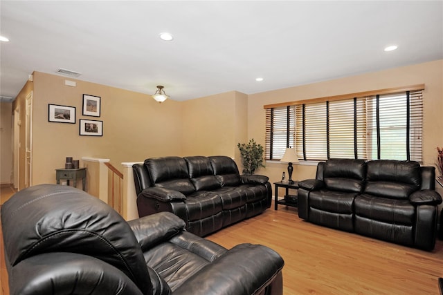 2228 Stacey Ct, North Bellmore, NY 11710 - living area with light wood-type flooring, plenty of natural light, and recessed lighting