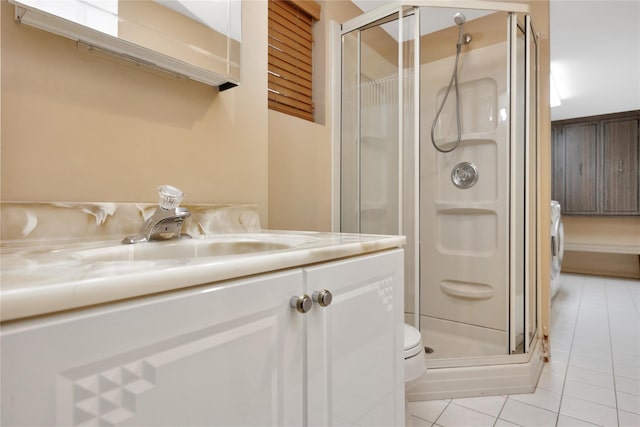 2228 Stacey Ct, North Bellmore, NY 11710 - bathroom featuring tile patterned floors, a shower stall, and vanity