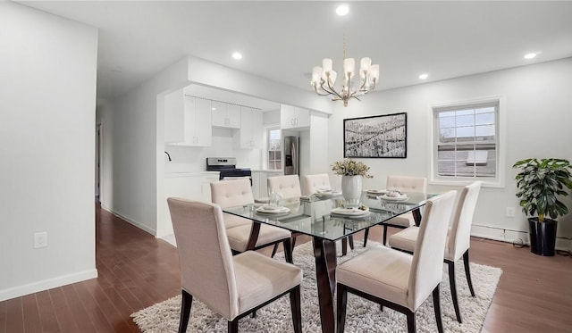 2155 Walton Ave, Bronx, NY 10453 - dining space with a chandelier, dark wood finished floors, baseboards, and recessed lighting
