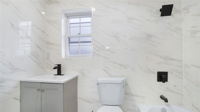 2155 Walton Ave, Bronx, NY 10453 - bathroom with vanity, toilet, tile walls, and  shower combination