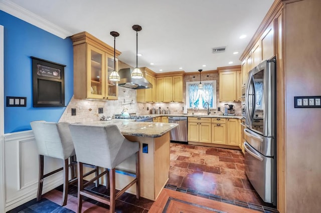 2346 Post St, East Meadow, NY 11554 - kitchen with stainless steel appliances, a peninsula, glass insert cabinets, a sink, and a breakfast bar area