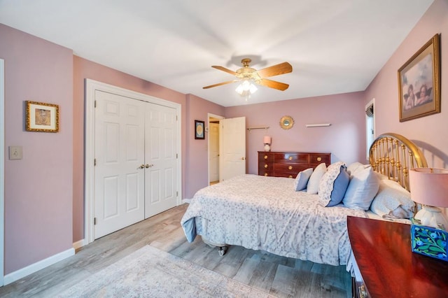 2346 Post St, East Meadow, NY 11554 - bedroom with wood finished floors, baseboards, a closet, and a ceiling fan