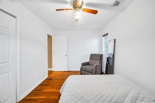2346 Post St, East Meadow, NY 11554 - bedroom with wood finished floors, baseboards, and a ceiling fan