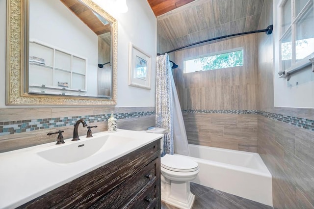 2346 Post St, East Meadow, NY 11554 - full bath with tile walls, toilet, shower / bathtub combination with curtain, vanity, and tile patterned flooring
