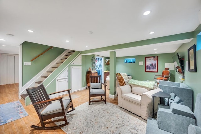 2346 Post St, East Meadow, NY 11554 - living area featuring stairs, wood finished floors, and recessed lighting