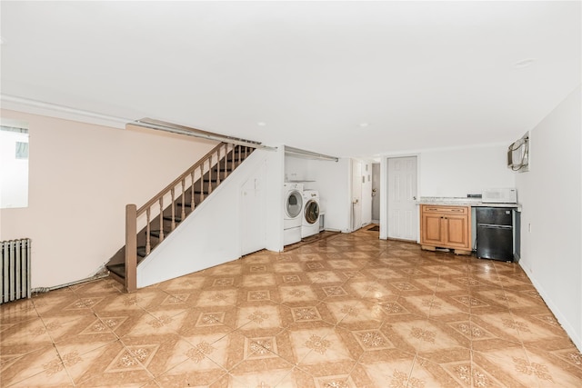 2733 Tenbroeck Ave, Bronx, NY 10469 - laundry room with washer and dryer and radiator