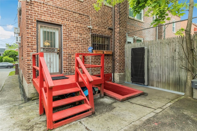 2733 Tenbroeck Ave, Bronx, NY 10469 - property entrance featuring brick siding