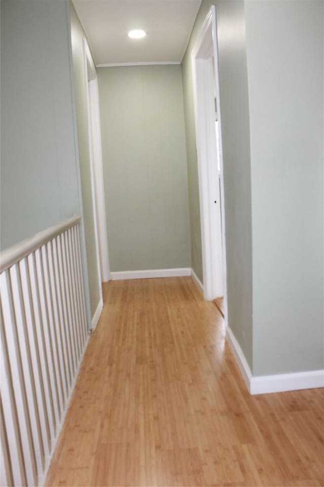 1535 Mattison St, Baldwin, NY 11510 - hallway with light wood-style floors and baseboards