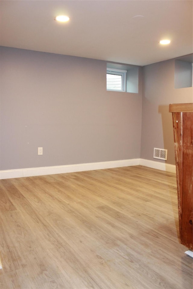 1535 Mattison St, Baldwin, NY 11510 - below grade area with light wood-style flooring, recessed lighting, and baseboards