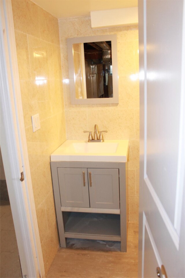 1535 Mattison St, Baldwin, NY 11510 - bathroom featuring tile walls and vanity