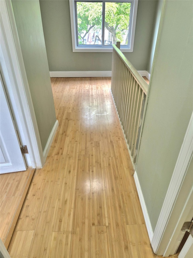 1535 Mattison St, Baldwin, NY 11510 - corridor featuring hardwood / wood-style floors and baseboards