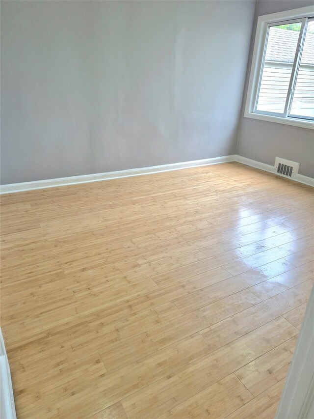 1535 Mattison St, Baldwin, NY 11510 - unfurnished room featuring light wood-style flooring and baseboards