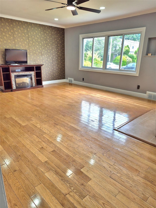 1535 Mattison St, Baldwin, NY 11510 - unfurnished living room with a ceiling fan, crown molding, hardwood / wood-style flooring, wallpapered walls, and baseboards